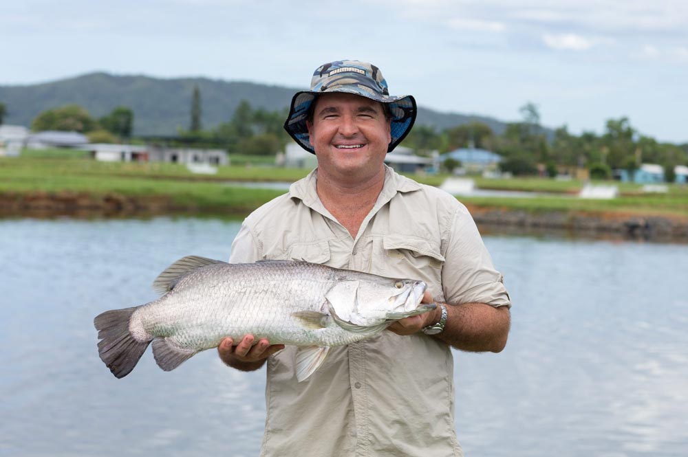 Farmer with Barramundi