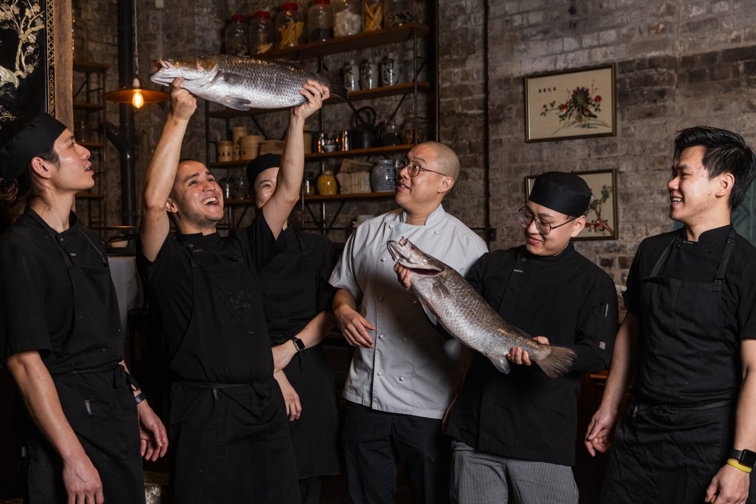 Chefs with Barramundi